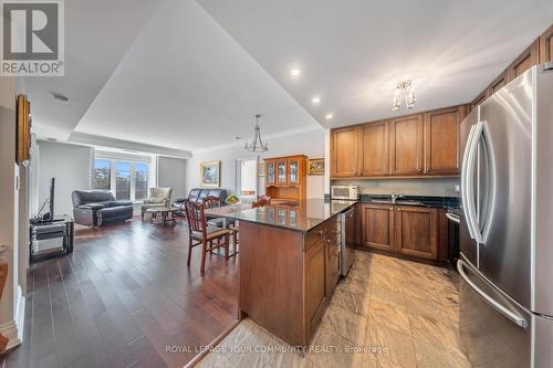 Ph 412 - 4620 Highway 7, Vaughan, ON - Indoor Photo Showing Kitchen With Stainless Steel Kitchen