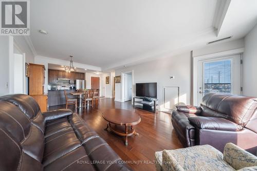 Ph 412 - 4620 Highway 7, Vaughan, ON - Indoor Photo Showing Living Room