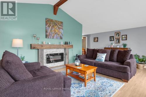 17206 Highway 41, Addington Highlands, ON - Indoor Photo Showing Living Room With Fireplace