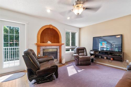 410 97B Highway, Salmon Arm, BC - Indoor Photo Showing Living Room With Fireplace