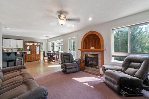 410 97B Highway, Salmon Arm, BC - Indoor Photo Showing Living Room With Fireplace