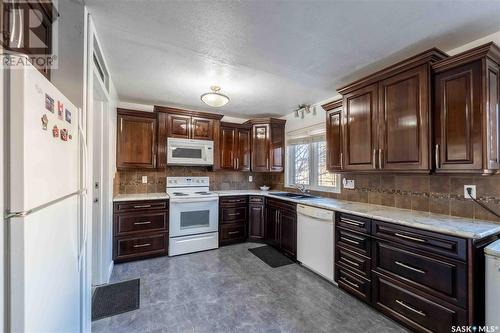 1314 Henleaze Avenue, Moose Jaw, SK - Indoor Photo Showing Kitchen With Double Sink