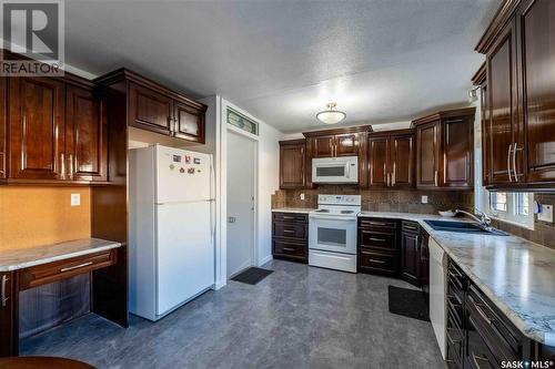 1314 Henleaze Avenue, Moose Jaw, SK - Indoor Photo Showing Kitchen With Double Sink