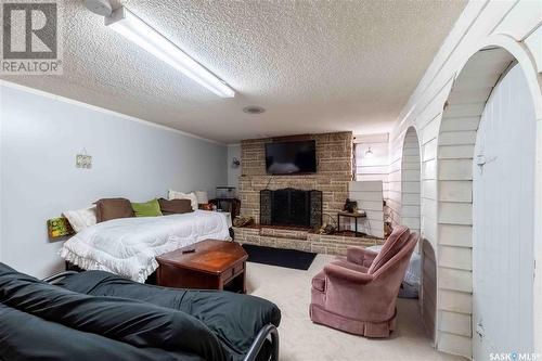 1314 Henleaze Avenue, Moose Jaw, SK - Indoor Photo Showing Living Room With Fireplace