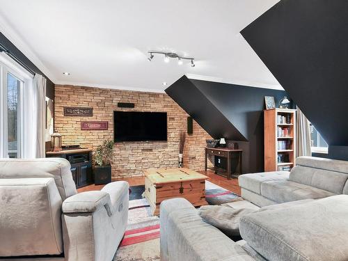 Salon - 2737 Av. Du Bocage, Mascouche, QC - Indoor Photo Showing Living Room With Fireplace