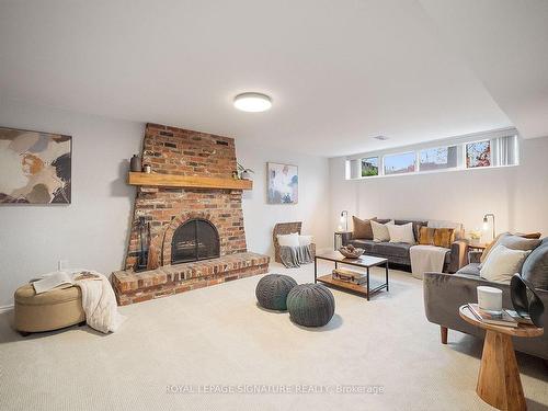 23 Wichey Rd, Toronto, ON - Indoor With Fireplace