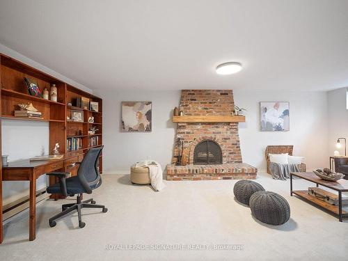 23 Wichey Rd, Toronto, ON - Indoor With Fireplace