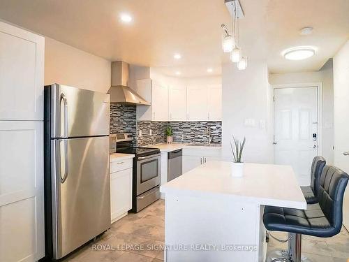 306-3055 Tomken Rd, Mississauga, ON - Indoor Photo Showing Kitchen With Upgraded Kitchen