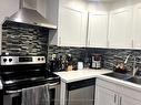 306-3055 Tomken Rd, Mississauga, ON  - Indoor Photo Showing Kitchen With Double Sink 