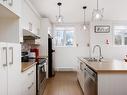 Cuisine - 1-8 Rue De Sicile, Candiac, QC  - Indoor Photo Showing Kitchen With Double Sink 