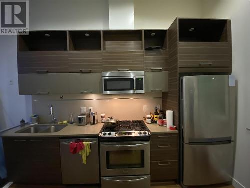 10 9150 University High Street, Burnaby, BC - Indoor Photo Showing Kitchen With Stainless Steel Kitchen With Upgraded Kitchen