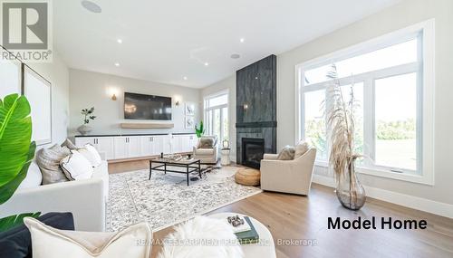 56 Workman Crescent, Blandford-Blenheim, ON - Indoor Photo Showing Living Room With Fireplace