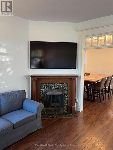 1117 Richmond Street, London, ON - Indoor Photo Showing Living Room With Fireplace