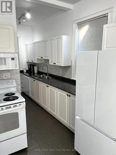 1117 Richmond Street, London, ON - Indoor Photo Showing Kitchen With Double Sink