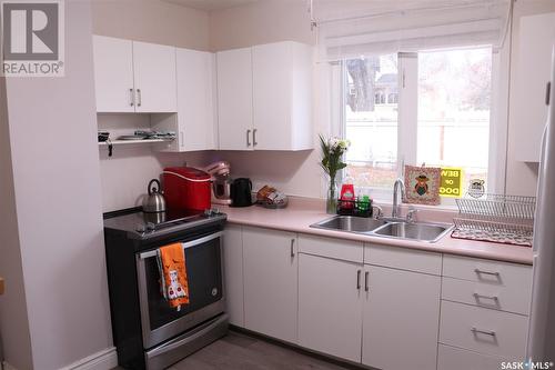 615 C Avenue N, Saskatoon, SK - Indoor Photo Showing Kitchen With Double Sink