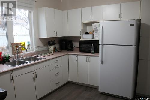 615 C Avenue N, Saskatoon, SK - Indoor Photo Showing Kitchen With Double Sink