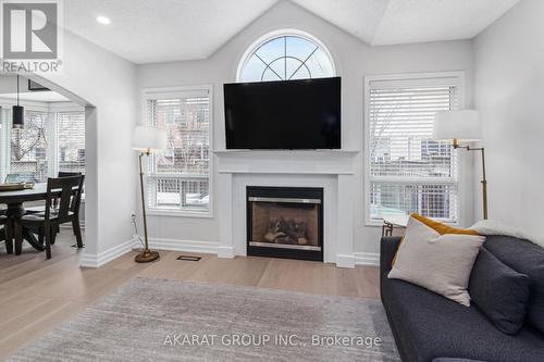 608 Brothers Crescent, Milton, ON - Indoor Photo Showing Living Room With Fireplace