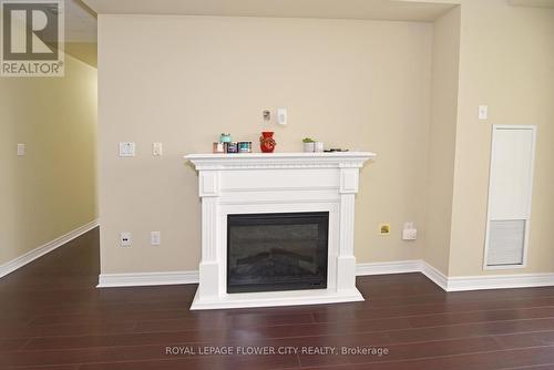 608 - 1030 Coronation Drive, London, ON - Indoor Photo Showing Living Room With Fireplace