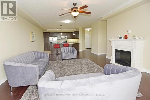 608 - 1030 Coronation Drive, London, ON - Indoor Photo Showing Living Room With Fireplace