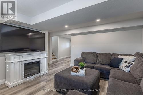 89 Dundee Drive, Haldimand, ON - Indoor Photo Showing Living Room With Fireplace