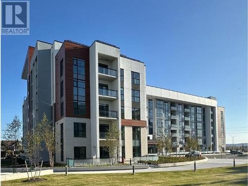 404 - 480 Gordon Krantz Avenue, Milton, ON - Outdoor With Balcony With Facade