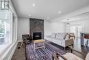 22 Shortland Crescent, Toronto, ON  - Indoor Photo Showing Living Room With Fireplace 