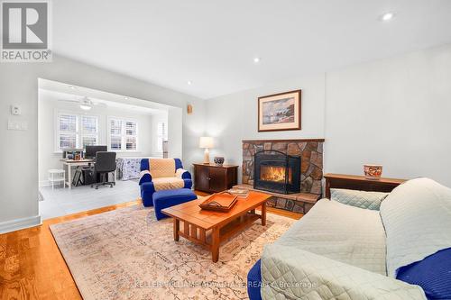 20 Superior Avenue, Toronto, ON - Indoor Photo Showing Living Room With Fireplace