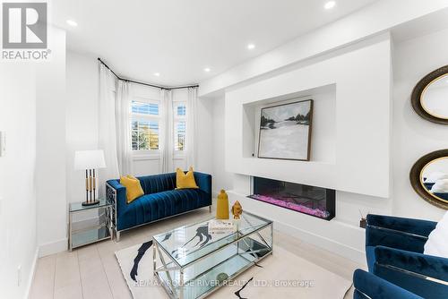 95 Piggott Mews, Toronto, ON - Indoor Photo Showing Living Room With Fireplace