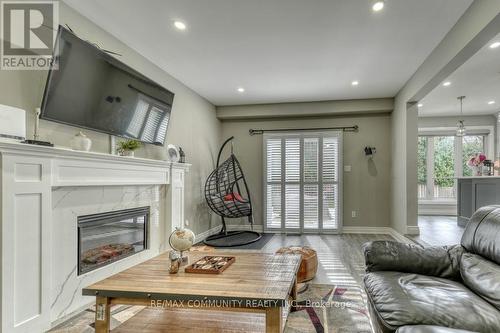 42 Coulton Court, Whitby, ON - Indoor Photo Showing Living Room With Fireplace