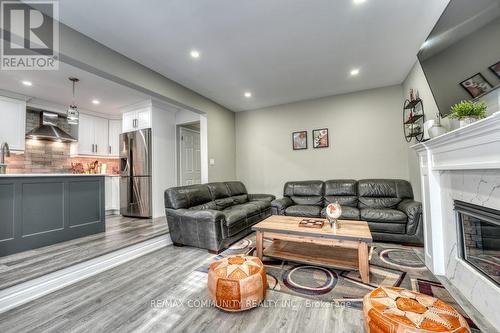 42 Coulton Court, Whitby, ON - Indoor Photo Showing Living Room With Fireplace