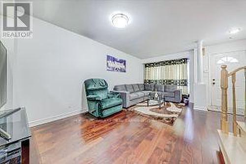 807 - 28 Rosebank Drive, Toronto, ON - Indoor Photo Showing Living Room