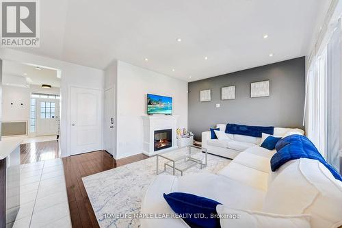 39 Snapdragon Square, Brampton, ON - Indoor Photo Showing Living Room With Fireplace