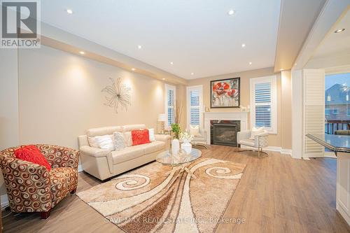 16 Casserley Crescent, New Tecumseth, ON - Indoor Photo Showing Living Room With Fireplace