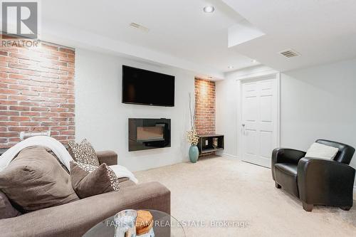 66 John W Taylor Avenue, New Tecumseth, ON - Indoor Photo Showing Living Room With Fireplace