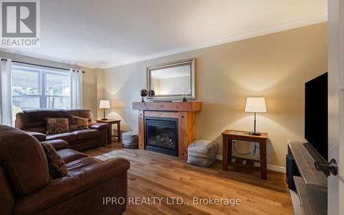 323 Bailey Drive, Orangeville, ON - Indoor Photo Showing Living Room With Fireplace