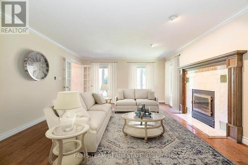 2087 Wilkinson Street, Innisfil, ON - Indoor Photo Showing Living Room With Fireplace