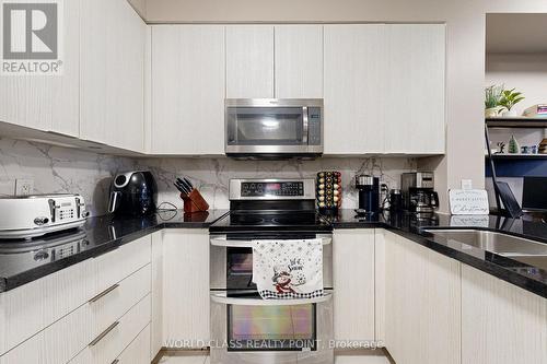 418 - 86 Woodbridge Avenue, Vaughan, ON - Indoor Photo Showing Kitchen