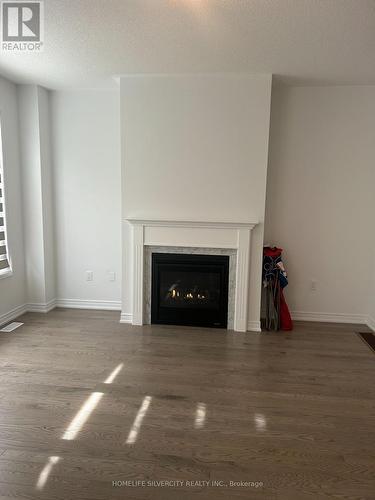 4 Kingsbury Trail, Barrie, ON - Indoor Photo Showing Living Room With Fireplace