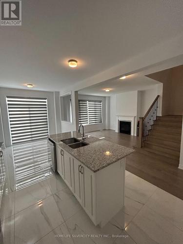 4 Kingsbury Trail, Barrie, ON - Indoor Photo Showing Kitchen With Double Sink