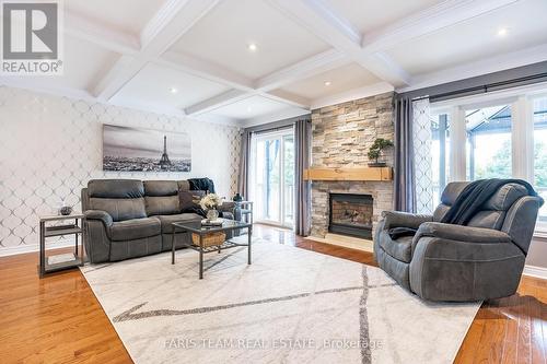 35 Princess Point Drive, Wasaga Beach, ON - Indoor Photo Showing Living Room With Fireplace