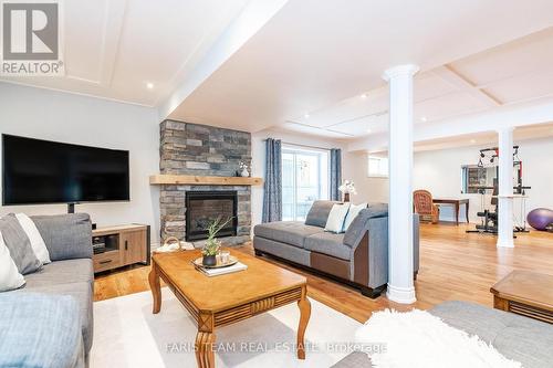 35 Princess Point Drive, Wasaga Beach, ON - Indoor Photo Showing Living Room With Fireplace