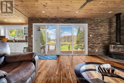 4055 Glen Cedar Drive, Ramara, ON - Indoor Photo Showing Living Room With Fireplace