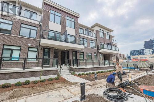 203 - 755 Omega Drive, Pickering, ON - Outdoor With Balcony With Facade