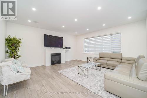 219 Lyle Drive, Clarington, ON - Indoor Photo Showing Living Room With Fireplace