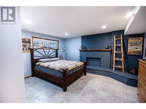 392 Teal Road, Kamloops, BC - Indoor Photo Showing Bedroom With Fireplace