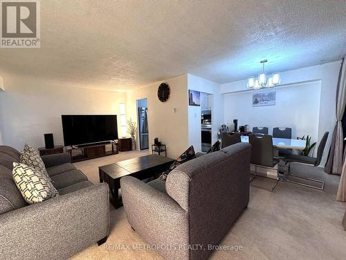 316 - 1801 O'Connor Drive, Toronto, ON - Indoor Photo Showing Living Room