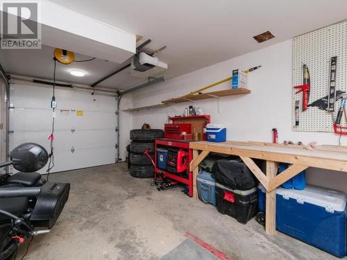 3B-2002 Centennial Street, Whitehorse, YT - Indoor Photo Showing Garage