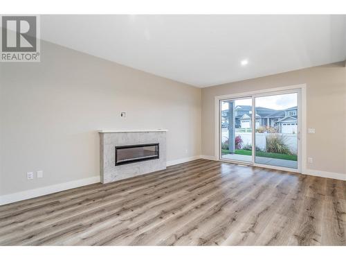 3368 Hawks Crescent, West Kelowna, BC - Indoor Photo Showing Living Room With Fireplace