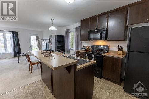 218 Shanly Private, Nepean, ON - Indoor Photo Showing Kitchen With Double Sink