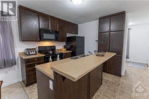 218 Shanly Private, Nepean, ON - Indoor Photo Showing Kitchen With Double Sink